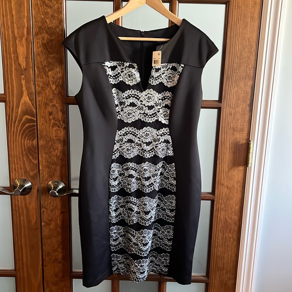 New with tags Ladies black dress with silver lace.  Size 14P.
